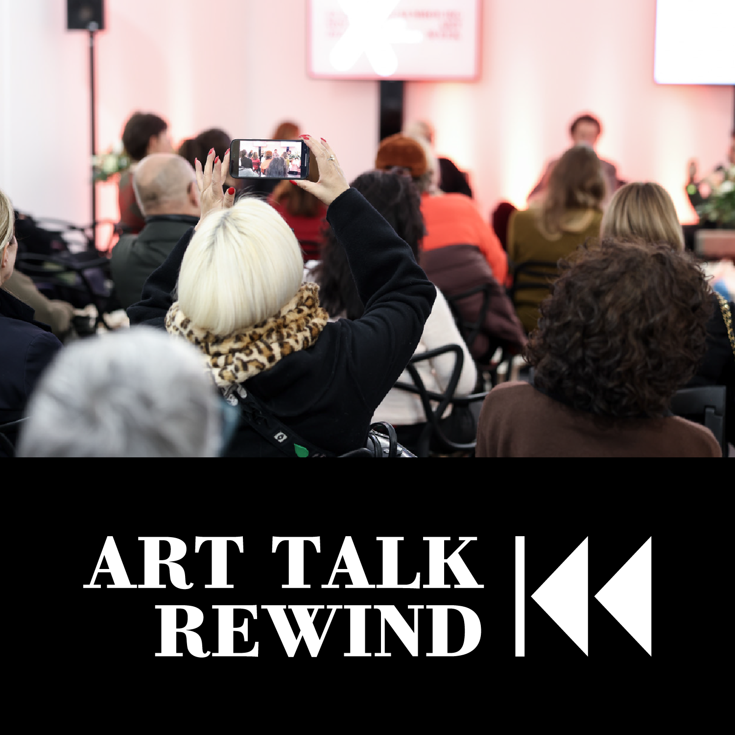 Audience attending Luxembourg Art Week Art Talk Programme, with people seated and one person recording on a smartphone; text overlay reads “Art Talk Rewind” with a rewind icon.